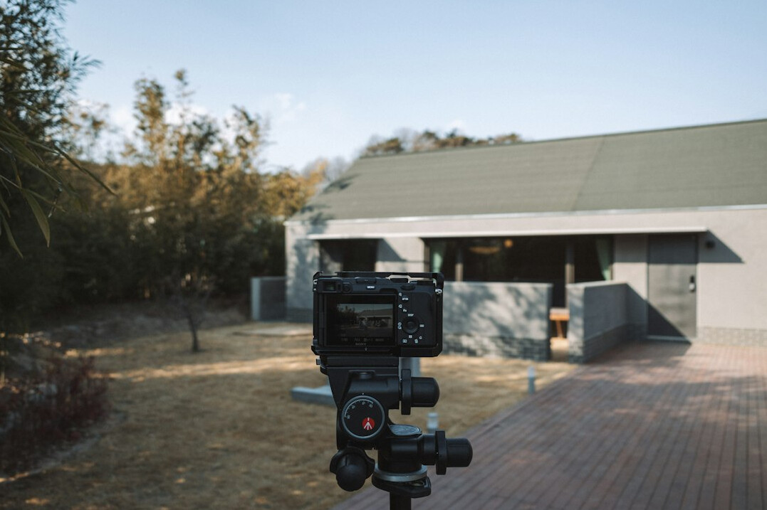 Outside broadcast camera crew filming a live event with professional equipment